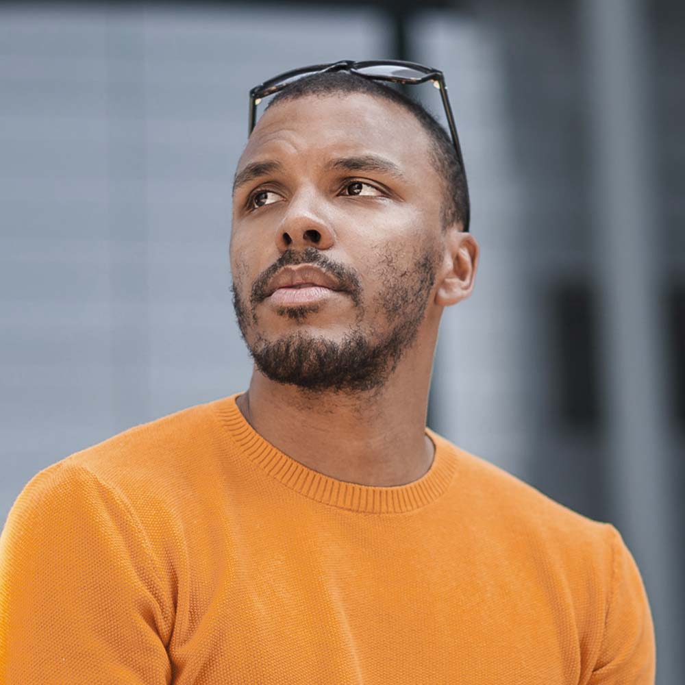 portrait of man wearing yellow